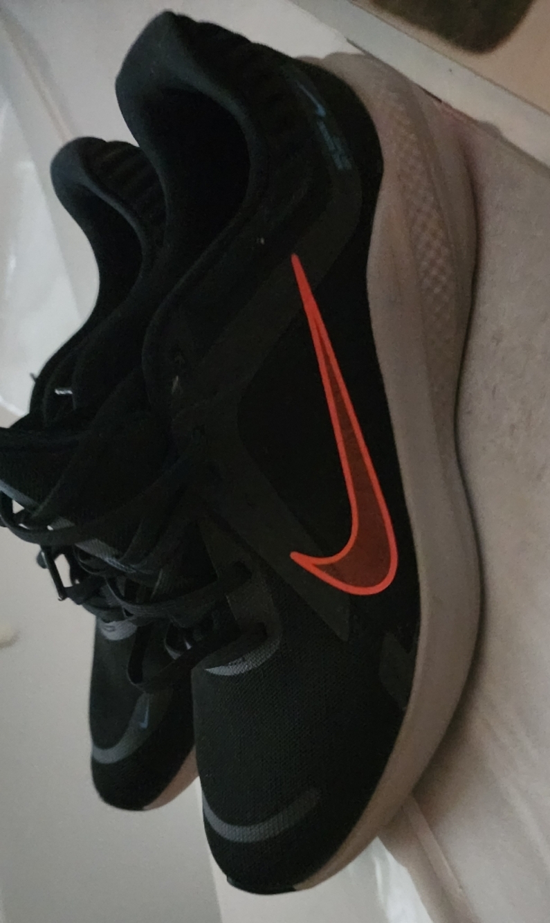 Nike Quest Black Trainers with Orange